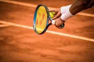 Photo by Gonzalo Facello: https://www.pexels.com/photo/close-up-photo-of-person-holding-tennis-racket-and-ball-1432039/