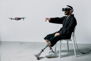 Man pointing on a flying drone. Photo by cottonbro studio.